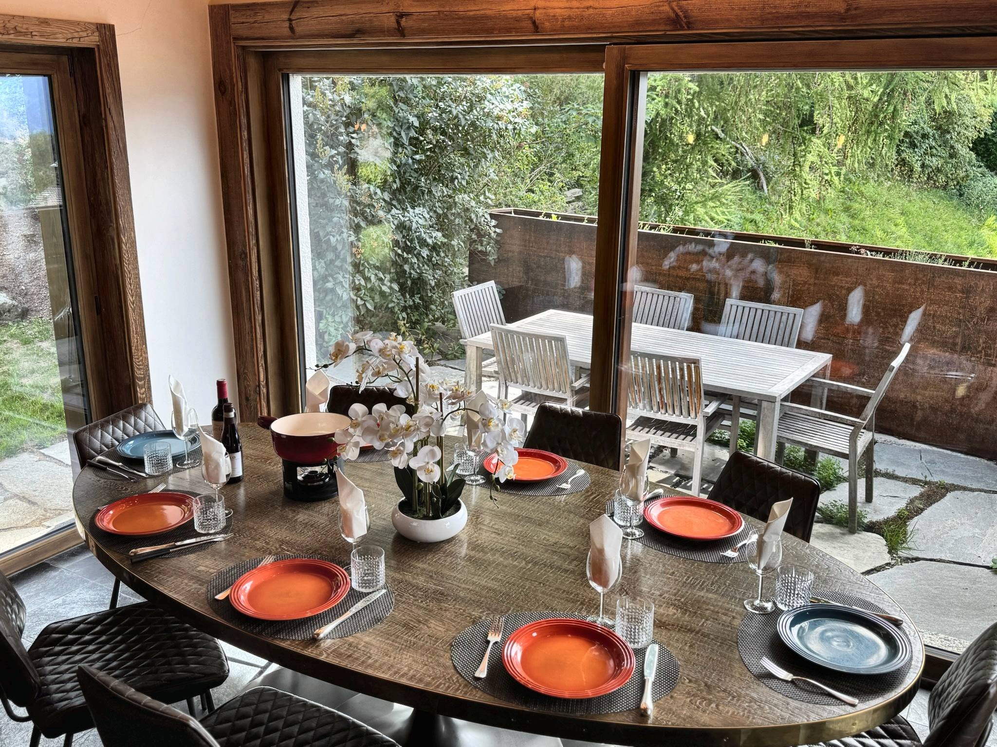 Table laid, terrace and mountains beyond