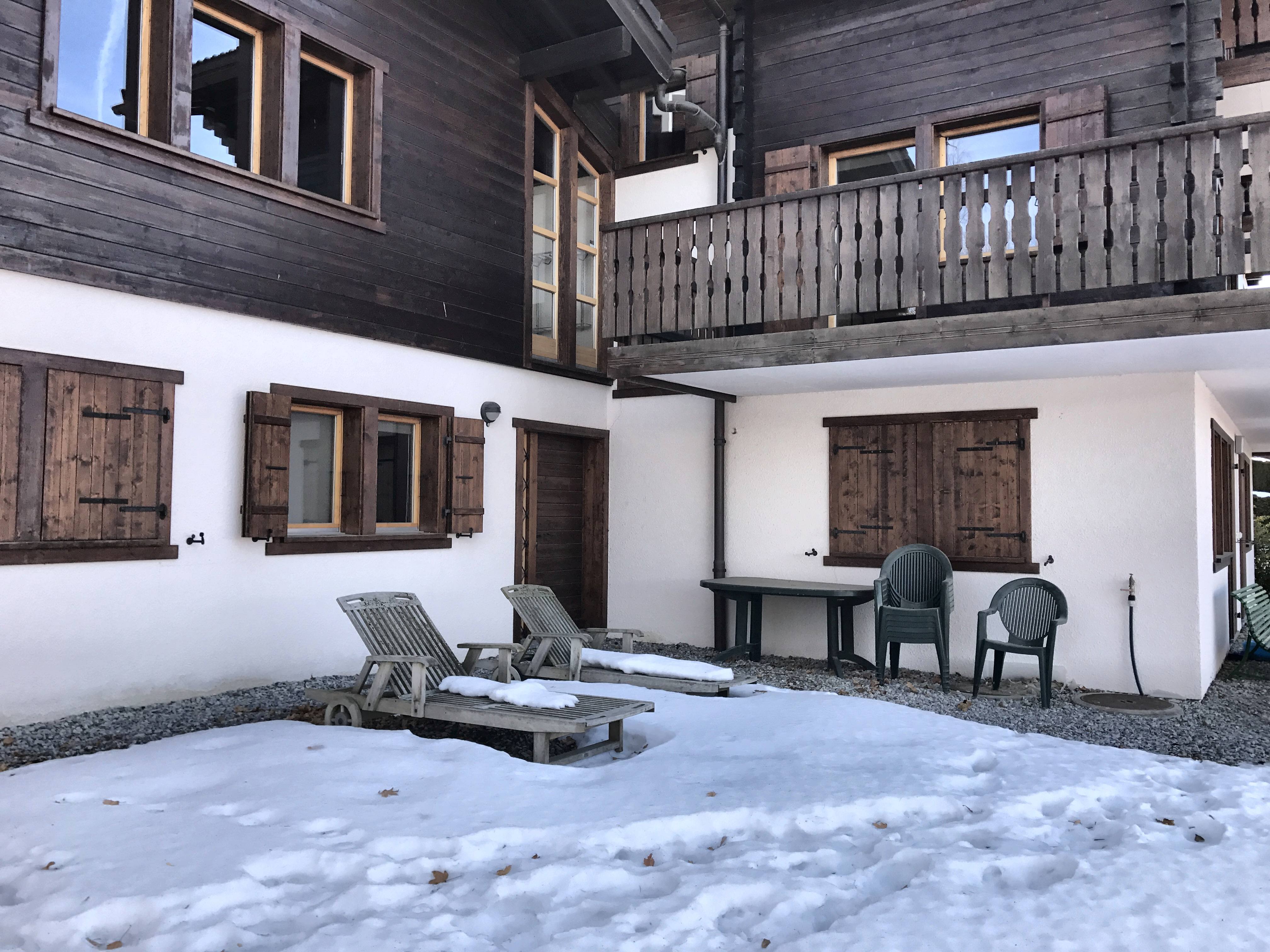 Terrace and loungers under snow